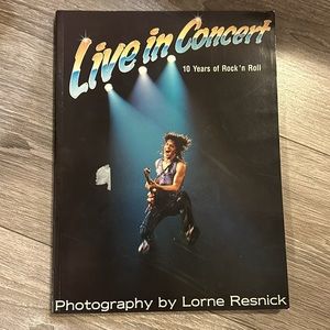 Live in Concert: 10 Years of Rock 'n' Roll. Paperback – Jan. 1 1987